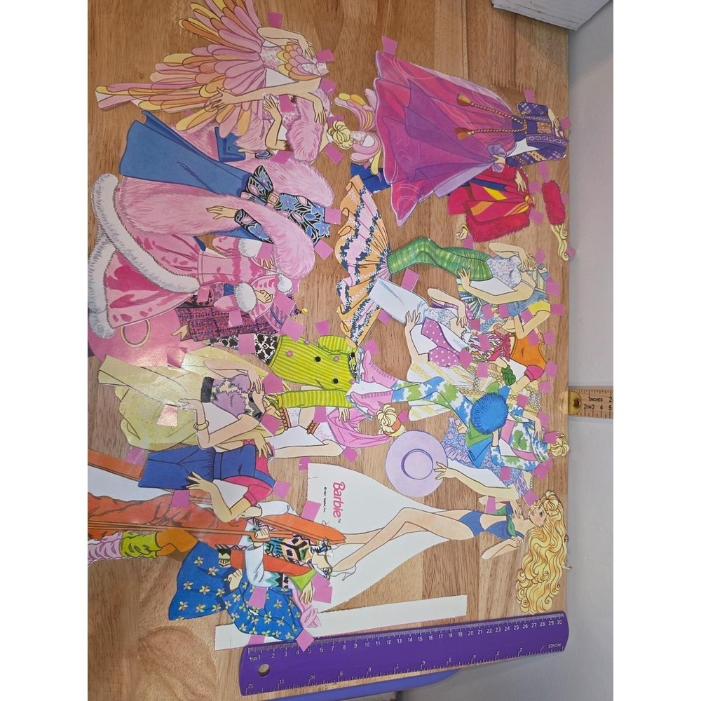 1991 vintage cut-out Barbie paper dolls and colorful paper outfits